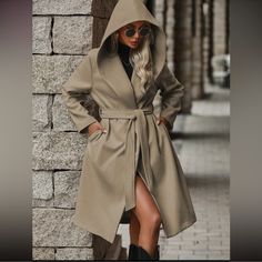 Classic Belted Pocket Hoodie Trench Coat Jacket S M L Xl, 100% Polyester, Ships In 7-8 Days Fall Outerwear With Adjustable Hood, Casual Hooded Workwear Outerwear, Casual Hooded Outerwear For Work, Trendy Long Sleeve Outerwear With Adjustable Hood, Casual Outerwear With Detachable Hood For Fall, Casual Fall Outerwear With Detachable Hood, Fall Casual Outerwear With Detachable Hood, Khaki Winter Hoodie Outerwear, Casual Outerwear With Adjustable Hood For Fall