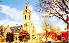 a painting of a church in the fall