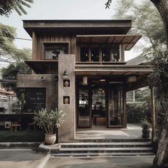 a house that is made out of concrete and wood