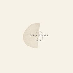 the logo for softy studio is shown in black and white on a beige background