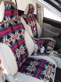 the interior of a car is decorated with colorful patterns