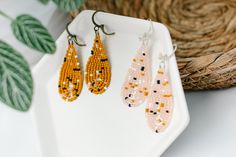 These cute little beaded earrings are a fun addition to your wardrobe. Each pair is handmade and unique....no two pairs will be the same! Available in Mustard or Rosaline. Measurements: Beaded portion approx 1.75" long 1" wide Bead Work Jewelry, Beaded Earrings, Bead Work, Beading, Mustard, Drop Earrings, Beads, Wardrobe, Yellow