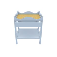 a baby changing table with a tray on the top and an open drawer underneath it