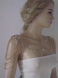 "Shoulder Necklace Bridal shoulder necklace Sizes: XS / Shoulder Measurement 13.5'' S / Shoulder Measurement 14.5\" M / Shoulder Measurement 15.5\" L /Shoulder Measurement 16.5\" Thank you so much for choosing my store. It is very importent to let my customers happy, so dont hesitate to contact me for your questions. Standart shipping I ship from Turkey , General delivery durations are USA : 12 /20 days Canada : 10/20days Australia: 15/25 days" Glamorous Crystal Body Chain For Wedding, Elegant Wedding Body Chain With Rhinestones, Elegant Rhinestone Body Chain For Wedding, Gold Rhinestone Body Jewelry For Wedding, Glamorous Gold Backdrop Necklace For Wedding, Gold Embellished Bridal Necklace For Party, Glamorous Beaded Backdrop Necklace For Weddings, Elegant White Body Chain For Wedding, Gold Embellished Wedding Jewelry