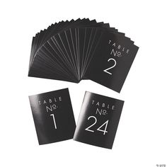 black table numbers are laid out on top of each other