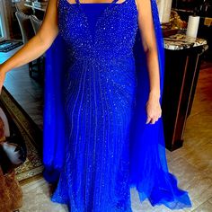 Beautiful Royal Blue Dress With Beaded Cape New Blue Embellished Floor-length Mother Of The Bride Dress, Blue Embellished Gown For Mother Of The Bride, Blue Floor-length Evening Dress With Rhinestones, Blue Evening Dress With Rhinestones, Blue Rhinestone Evening Gown, Blue Floor-length Gown For Mother Of The Bride, Blue Evening Dress With Rhinestones For Gala, Elegant Blue Gown With Rhinestones, Blue Beaded Evening Dress For Wedding