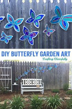 the butterfly garden art project is being displayed in front of a fence