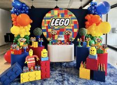 lego themed birthday party with balloons and decorations