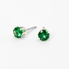 When the occasion calls for major sparkle, reach for these stunning studs featuring bright green cubic zirconia stones. The faceted stones are set in silver-tone to match your other silver jewelry. Finish: Silver-tone Diameter: 5MM Shape: Round Setting: 6 prong Closure: Post back Material: Cubic zirconia, Metal - Claire's Silver Round Cubic Zirconia Stud Earrings - 5MM, Green Claires Earrings, Piercing Kit, Earring Sets, Rose Gold Crystal, Geometric Studs, Mini Hoop Earrings, Fashionable Jewelry, Star Earrings Stud, Earrings Green