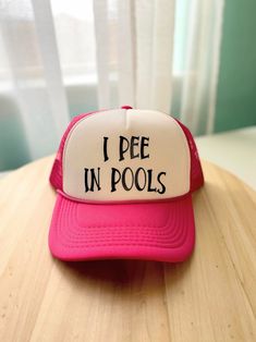 I pee in pools snapback trucker hat. ❤ Favorite this item + Favorite our shop, and we'll keep giving you more to love at Pump Up The Vinyl.❤ https://www.etsy.com/shop/pumpupthevinyl  ** DESCRIPTION ** These unique custom trucker hats are MADE TO ORDER hats are truly one of a kind.  All of our hats are SnapBack, so they can easily be adjusted to size.  Please convo me via Etsy prior to ordering if you have any sizing questions at all, because all of our hat orders are custom/made to order and we Pink Fun Sun Hat For Beach Season, Fun Summer Baseball Cap With Curved Brim, Trendy Beach Sun Hat With Letter Print, Trendy Sun Hat With Letter Print For Beach, Trendy Letter Print Sun Hat For The Beach, Cute Summer Baseball Cap, Pink Flat Brim Hat For Beach Season, Playful Summer Trucker Hat With Curved Brim, Summer Playful Snapback Trucker Hat