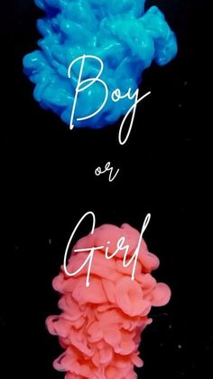 the words boy or girl are painted in blue and pink ink on a black background