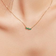 Inspired by nature's first blooms, ethical emeralds huddle together, reminiscent of flower petals blossoming on the chest. Cast with high-end recycled gold, the minimalist faceted chain adds an extra touch of brilliance to this playful necklace. Accent stones: Emeralds, 0.20+ ctw Chain width: 1 mm approx. Chain length: 16 / 18 in. Chain type: Diamond-cut trace chain Closure: Lobster clasp Chain Types, Emerald Pendant Necklace, Emerald Necklace Pendant, Necklace Chain Types, Emerald Pendant, Precious Gems, Recycled Gold, Conflict Free Diamonds, Necklace Chain