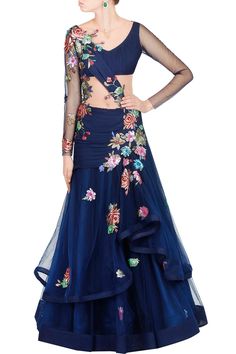 Featuring a blue floor length flared gown in the shades of red, pink and green textured floral embroidery. This gown has a can-can layer underneath and side zip closure. Fashion Design Inspiration, Saree Gowns, Western Gown, Saree Gown, Online Saree, Ghagra Choli, Net Saree, Indian Couture, Lehenga Designs