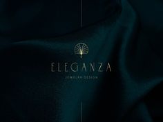 the elegant logo for elegance design is shown in gold and green colors on a black background