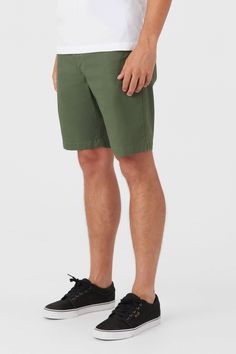 This is a classically styled chino walkshort with added stretch fabrication. The 20" outseam fits at the knee. O'Neill Men's walkshort 20" Outseam - At the knee fit Standard fit Cotton stretch slub Back welt pockets Natural faded wash 99% Cotton, 1% Elastane Classic Knee-length Cotton Bermuda Shorts, Classic Solid Bermuda Shorts With Short Inseam, Summer Classic Chino Cotton Twill Bottoms, Classic Summer Bottoms In Chino Cotton Twill, Casual Bermuda Shorts With Welt Pockets, Casual Cargo Shorts With Welt Pockets, Fitted Green Bermuda Shorts, Casual Style, Classic Green Short Length Bottoms, Classic Relaxed Fit Bermuda Shorts In Solid Color