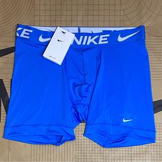 Brand New With Tags In Sealed Oem Packaging Nike Pro Dri-Fit Men's 6" Performance Boxer Brief Compression Shorts 1 Pair Blue/ White Men's Size M, L, & Xl Features Nike Dri-Fit Technology Moves Sweat Away From Your Skin For Quicker Evaporation, Helping You Stay Dry And Comfortable. Stretch Fabric Lets You Move Freely. Wide Hems Help Keep Underwear In Place. Flat Seams Feel Smooth Against Your Skin. Details 1-Pack Nike Swoosh Logo Front Left Thigh Repeated Nike Logo On Waistband Tagless No Fly 6" Blue Boxer Briefs With Built-in Shorts For Sports, Blue Brief Sports Shorts, Blue Sporty Boxer Briefs For Gym, Sporty Blue Boxer Briefs For Gym, Breathable Blue Sports Shorts, Blue Boxer Briefs For Gym, Breathable Blue Shorts For Sports Events, Blue Breathable Shorts For Sports Events, Blue Short Length Boxer Briefs For Gym