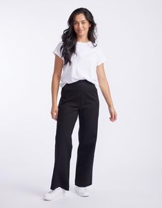 DESCRIPTION Discover the Timeless Straight Leg Ponti Pant, a wardrobe essential from White & Co. that promises comfort and style for any setting. Crafted in classic black, these pants offer a flattering, relaxed fit and showcase a subtle yet chic black tape down the sides. The perfect versatile work-to-weekend piece, they pair beautifully with a crisp white tee and classic blazer for a monochromatic look, or add a pop of colour with a patterned blouse for an effortless transition from day to nig Classic Straight Leg Sweatpants With Elastic Waistband, Casual Minimal Stretch Ankle-length Pants, Casual Ankle-length Pants With Minimal Stretch, Minimal Stretch Ankle-length Casual Pants, Effortless Straight Leg Bottoms For Workwear, Versatile Wide-leg Dress Pants With Relaxed Fit, Versatile Wide Leg Sweatpants For Everyday, Black Wide Leg Workwear Pants With Straight Hem, Black Wide Leg Pants For Work With Straight Hem