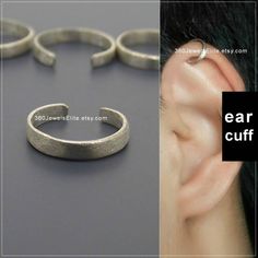 an ear cuff is shown with the words ear cuff cut out in front of it