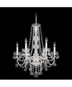 a crystal chandelier hanging from the ceiling