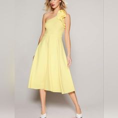 Make A Statement At Your Next Event With This Stunning Eliza J One Shoulder Ruffle Dress In Size 12. The Beautiful Solid Yellow Chiffon Fabric Is Adorned With Delicate Flower Accents And A Charming Ruffle Detail, Which Makes This Dress Perfect For Any Formal Occasion. The Dress Is Designed With A Flattering Fit And Flare Style And Features A One-Shoulder Neckline, Cap Sleeves, And A Zip Closure. Crafted From A Blend Of Polyester, Spandex, And Polyester Fabric, This Dress Is Comfortable And Light One Shoulder Ruffle Dress, Eliza Dress, Shoulder Ruffle Dress, Eliza J Dresses, Eliza J, Midi Length Dress, Delicate Flower, Chiffon Fabric, Solid Yellow