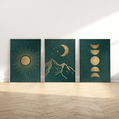 three green and gold art prints with the moon, stars, and mountains on them