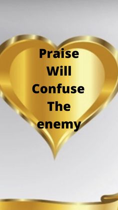 a gold heart with the words praise will confuse the enemy