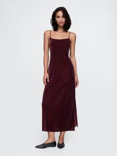 Soft, smooth velvet maxi slip dress.  Scoop neck.  Adjustable spaghetti straps.  Slit at hem.  This dress is made with 100% recycled polyester.  Compared to virgin materials, using recycled materials helps to reduce resource use and waste.  Fit: Slim.  An A-line silhouette that sits close to the body with a flared opening.  Hits below the knee.  Models wearing Gap Glamorous Fashion, Velvet Maxi, Midi Slip Dress, Slim Fit Casual Shirts, Nightwear Women, Maxi Slip Dress, Grad Dresses, Dress Inspiration, Fashion Board