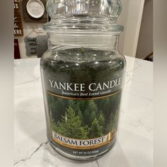 yankee candle jar sitting on top of a counter