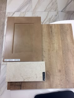 some brown and white tile sitting on top of a counter