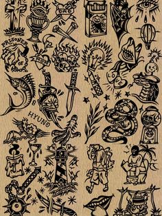 an old school tattoo design on a piece of paper, with various symbols and designs