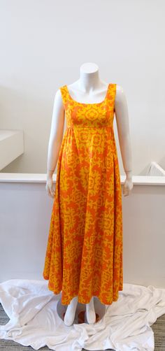 "1970's Vintage Floral Two Tone Orange and Yellow Cotton Empire Waist Maxi Long Dress Sleeveless Vibrant Bright Amazing Designed by Monte Streitfield for STREGA High Empire Waist line with small loops for belt addition Zipper back Size small 0- 2 Measurements: (flat) 13\" Back Shoulders 17\" Bust Line ( no give so perhaps a 32b or c) 15\" Empire Line 13\" from shoulder seam to bottom empire band 54\" Length of Garment Arm Scythe 7.5\" in front and 8.5\" in back scant hem no belt Dry Cleaned and Empire Waist Maxi, Maxi Long Dress, Shirtwaist Dress, Old Dresses, Star Dress, Modern Dress, Orange And Yellow, Vintage Girls, 1960s Vintage