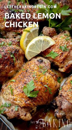 baked lemon chicken in a pan with herbs and lemon wedges on the side for garnish