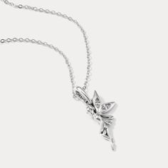 Transport yourself to a realm of enchantment with our Silver Fairy Necklace, inspired by Wonderland's whimsical magic. This delicate piece features a gracefully designed fairy pendant in sterling silver, capturing the essence of fantasy and wonder. Embrace the charm of fairytale allure, whether adding a touch of magic to everyday wear or making a statement at special occasions. Let the Silver Fairy Necklace be a tangible reminder of the captivating tales that unfold in the realms of imagination. DETAILS Materials:   925 Silver, Cubic Zirconia Length:  15.75 "(40cm)  + Extender: 1.97"(5cm) Pendant   Size :  0.47"*1.02"(1.2cm*2.6cm) Weight:  3.1 g Enchanting Silver Necklace, Magical Silver Pendant Necklace, Silver Pendant Charm Necklace With Magical Style, Fairy Style Silver Jewelry For Gift, Fairy Style Sterling Silver Jewelry, Fairy Pendant Jewelry Gift, Sterling Silver Fairycore Jewelry, Fairy Style Pendant Jewelry Gift, Fairycore Sterling Silver Jewelry