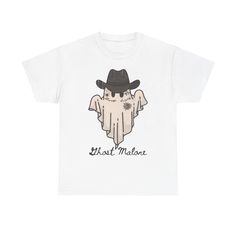 Western-inspired T-shirt featuring a ghost malone design, perfect for Halloween and fall. This unisex heavy cotton tee offers a comfy, relaxed fit with a classic crew neckline that can blend into any casual or semi-formal occasion. Relevant for fans of Post Malone and those looking for a unique holiday shirt. Product features - Shoulder tape for added stability - Knitted in one piece without side seams - Highly elastic ribbed knit collar - Made from strong and smooth specially spun fibers - Medium fabric made of 100% sustainable and durable cotton Care instructions - Machine wash: warm (max 40C or 105F) - Non-chlorine: bleach as needed - Tumble dry: medium - Do not iron - Do not dryclean Unisex T-shirt For Fall Streetwear, Fall Hip Hop Short Sleeve T-shirt, Hip Hop Short Sleeve T-shirt For Fall, Halloween Streetwear T-shirt With Band Logo, Hip Hop Halloween Tops With Screen Print, Halloween Band Logo T-shirt For Streetwear, Fall Band Merch Shirt For Streetwear, Band Merch Shirt For Fall Streetwear, Band Merch Shirt For Streetwear In Fall