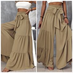 Shirred Waist Tie Front Ruffle Hem Wide Leg Pants Ships In 7-10 Days~All Purchases Are Shipped With A Special Gift 100% Polyester Slight Stretch Loose Fit Wide Leg Size Tags Are In Letters S-(4) M-(6) L-(8/10) Xl-(12) Do You Love? Anthro Festival Preppy Casual Mumu Revolve Spell Reformation Puff Popular Swim Contemporary Layering Free People Cami Dress Top Events Lulu Vacation Beach Contemporary Anniversary Boat Weekend Pool Swim Night Out~Then Visit My Store Bohemian Ruffled Bottoms In Solid Color, Khaki Wide Leg Pants For Summer, Ruffled Wide Leg Pants, Button Fly Pants, Beachy Dresses, Tie Waist Pants, Black Faux Leather Leggings, Work Chic, Looks Black