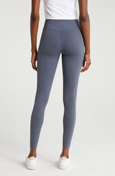 These performance leggings feature a high waist for smoothing coverage and a minimal seam design so they feel like a second skin through every activity. Pull-on style UPF 50+ sun protection 80% nylon, 20% polyester Machine wash, line dry Imported High Rise Tight Athleisure Leggings, Compressive Mid-rise Elastane Tights, Tight High Rise Athleisure Leggings, Sleek Supportive Bottoms For Training, Go-dry Mid-rise Leggings For Pilates, Mid-rise Go-dry Leggings For Pilates, Mid-rise Moisture-wicking Leggings For Pilates, Functional Mid-rise Tight Leggings, Functional Tight Mid-rise Leggings