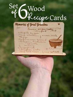 a hand holding up a wooden recipe card with the words, set 6 wood kege cards