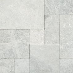 a white marble tile floor texture or background