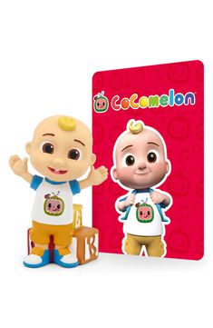 an image of a baby doll next to a book with the words cocomelon on it