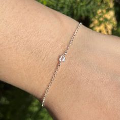 925 Silver + E-Coat (Anti-Tarnish) Width: 4mm Height:4mm Chain Length: 15cm + 3cm Extension Chain Thickness: 1.00mm Sterling Silver Care:  1. Wear your jewelry more often. The natural oils in your skin prevent tarnishing. 2. Store your silver in a cool, dry place when not in use.  3. Do Not wear on chlorinated water. Harsh chemicals may cause tarnishing. 925 Sterling Silver is 92.5% pure silver and 7.5% other metals, usually copper. By adding copper it strengthens and makes the metal more durable. Bracelet For Her, Silver Heart Bracelet, Bracelet Heart, Bracelet Dainty, Dainty Bracelet, Pastel Pink Aesthetic, For Her Gifts, Bracelet Sterling Silver, Dainty Bracelets