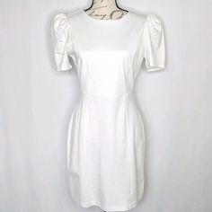 Gianni Bini Bright White Sheath Dress With Ruched Puff Sleeves. Zipper And Hook And Eye Closure In Back Center. Excellent Condition. New With Tags. Very Nice Material Approximate Measurements Laying Flat For Size Large Pit To Pit- 18" Length- 35" For Size Small Pit To Pit- 16" Length- 33" White Puff Sleeve Dress For Work, Fitted White Puff Sleeve Dress For Daywear, White Fitted Puff Sleeve Dress For Daywear, White Ruched Puff Sleeve Fitted Dress, Elegant Puff Sleeve Mini Dress With Lining, Elegant Mini Dress With Puff Sleeves And Lining, Elegant Puff Sleeve Mini Dress Lined, White Knee-length Puff Sleeve Dress For Date Night, Bright Shorts