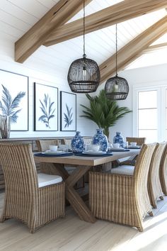 a dining room with wicker furniture and blue and white vases on the table