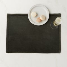 Dark green velvet placemat elevates the table setting in sophisticated style. CB2 exclusive.  -100% cotton velvet -Dry-clean only -Made in India Green Velvet Placemat Velvet Placemats, Dark Green Velvet, White Velvet, Black Table, Grey Velvet, Open Weave, Gray Linen, Cotton Velvet, Linen Napkins