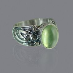 Vintage Green Moonstone Ring Silver Angel for Women Jewelry Occasion: Party, wedding, birthday, anniversary, gift mosaic: ring with green stone Style: Vintage Shape\pattern: Geometric Setting Type: Tension Setting Rings Type: Cocktail Ring Occasion: Engagement, Anniverssary Metals Type: Silver Material: Green Emerald Item Type: Rings Gender: Women Brand Name: Genuine-Gemstone Vintage Green Rings With Stone Setting, Green Spiritual Birthstone Rings, Green Cabochon Round Stone Rings, Spiritual Green Birthstone Ring, Green Birthstone Ring For Spiritual Occasions, Art Deco Green Cabochon Rings, Green Cabochon Art Deco Rings, Green Cabochon Rings In Art Deco Style, Handmade Green May Birthstone Ring