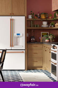 a white refrigerator freezer sitting inside of a kitchen