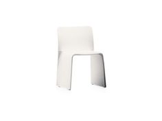 a white chair sitting on top of a white floor