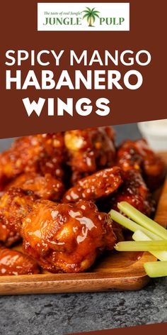 spicy mango habanero wings with celery on the side and text overlay that reads spicy mango habanero wings