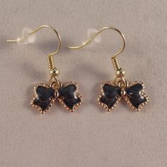 These Pearl Black Bow Dangle Earrings Are Gold Plated, Hand Painted, And On Hypoallergenic Hooks That Won't Hurt Your Ears. They Are Brand New, Handmade And Have Never Been Worn. Lead And Nickel Free. Rubber Backs Included. These Fine Quality Earrings Are Perfect And Comfortable For All Day, Everyday Wear, Special Occasions, Or A Special Gift. Get An $18 Gift Of Your Choice In My Listings With Purchase Of Two Or More Items. Please Send Offers And Questions. Black Hypoallergenic Jewelry For Party, Nickel-free Black Earrings For Party, Black Nickel-free Earrings For Party, Cute Black Jewelry For Party, Cute Black Hypoallergenic Jewelry, Black Hypoallergenic Earrings For Party, Cute Black Earrings As A Gift, Cute Black Earrings For A Gift, Cute Black Earrings For Gift