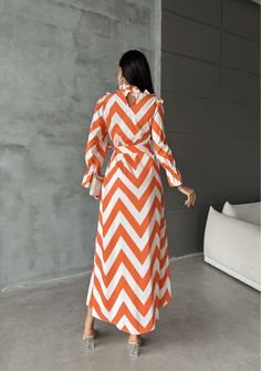 Feel effortlessly stylish and comfortable in our Striped Long Maxi Dress with Ruffles. Perfect for summer days, this dress is designed for those who want to enjoy the season while staying modest and chic. Made from lightweight cotton, this abaya-inspired dress is vacation-ready and will keep you cool all day long. Product Features: - Maxi length for a stylish and modest look. - Ruffle details add a feminine touch. - Made from breathable cotton to keep you comfortable in hot weather. - Perfect for summer vacations and beach days. - Easy to style for day or night looks. - Available in a variety of colors and stripe patterns. - Versatile dress that can be dressed up or down. - Flattering silhouette for all body types. Summer Long-sleeve Maxi Dress With Ruffle Hem, Maternity Floor-length Maxi Dress For Summer, Casual Multicolor Maxi Length Cover-up, Summer Floor-length Maternity Maxi Dress, Multicolor V-neck Maxi Dress With Ruffle Hem, Dress With Ruffles, Evening Jumpsuit, Summer Vacations, Maxi Dress Formal