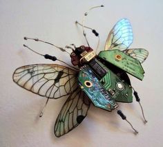 a bug made out of electronics and wires